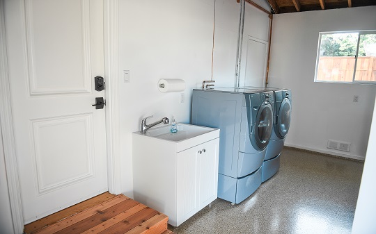 Full Laundry room With Granite Countertop